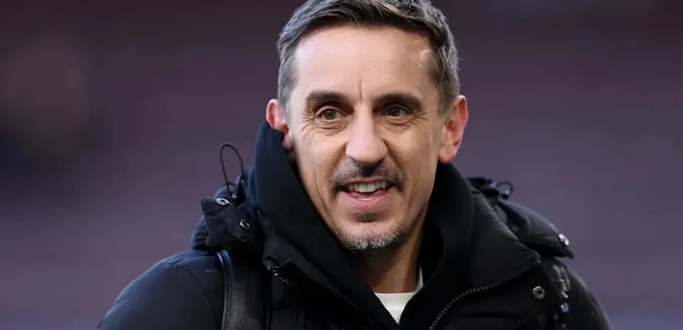Man smiling while wearing a black jacket