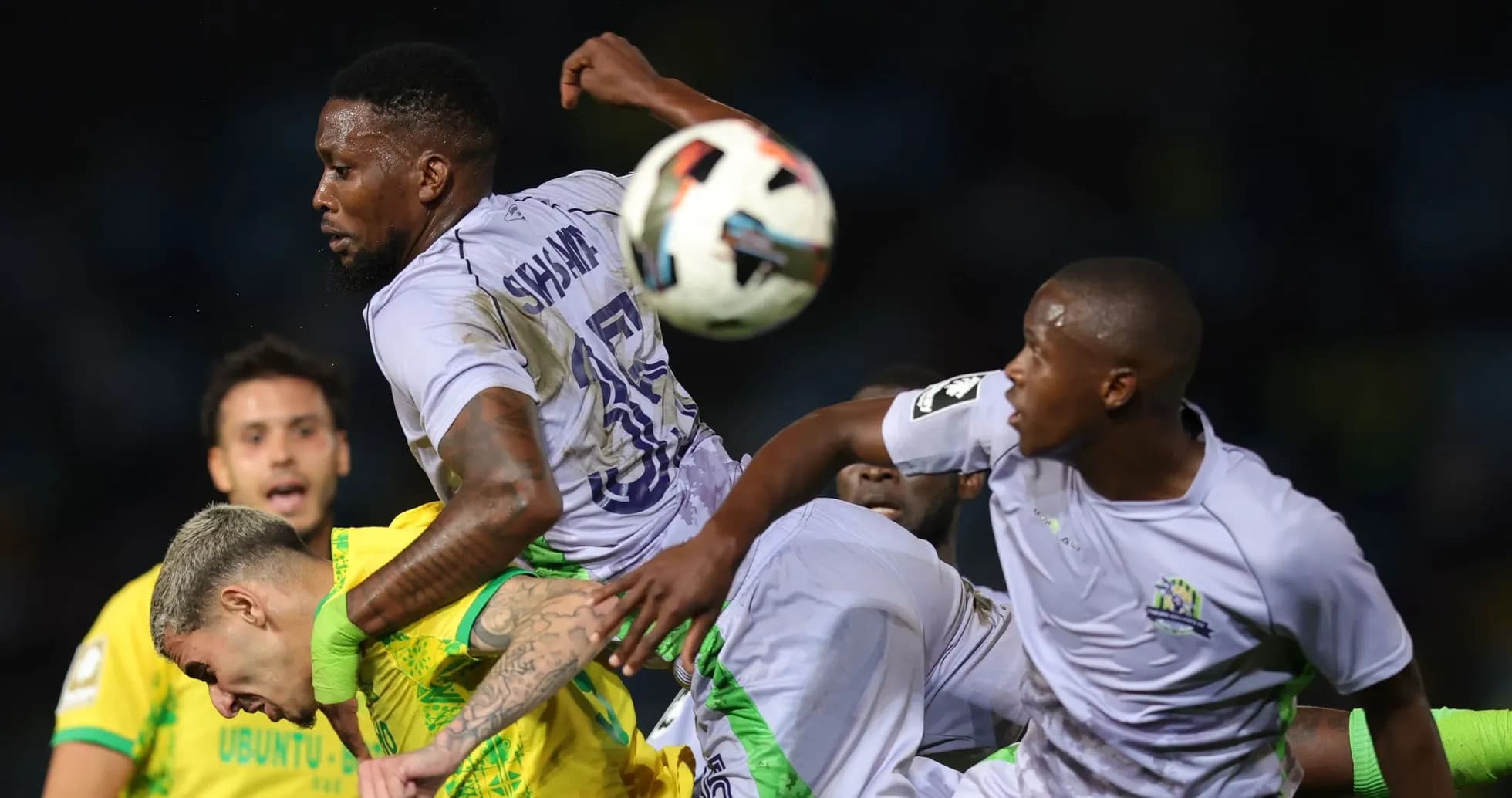 Players competing for the ball during a match