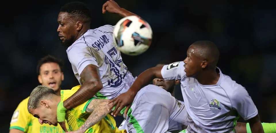 Players competing for the ball during a match