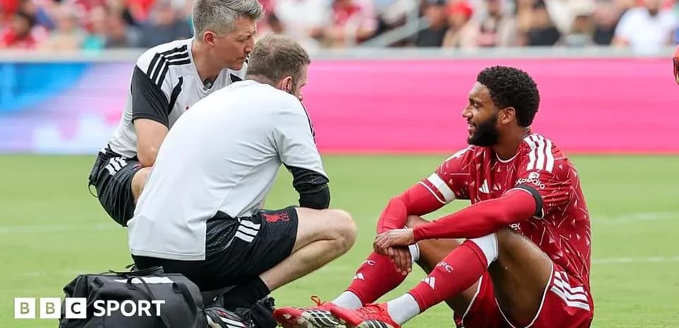 Player receiving medical attention on the field
