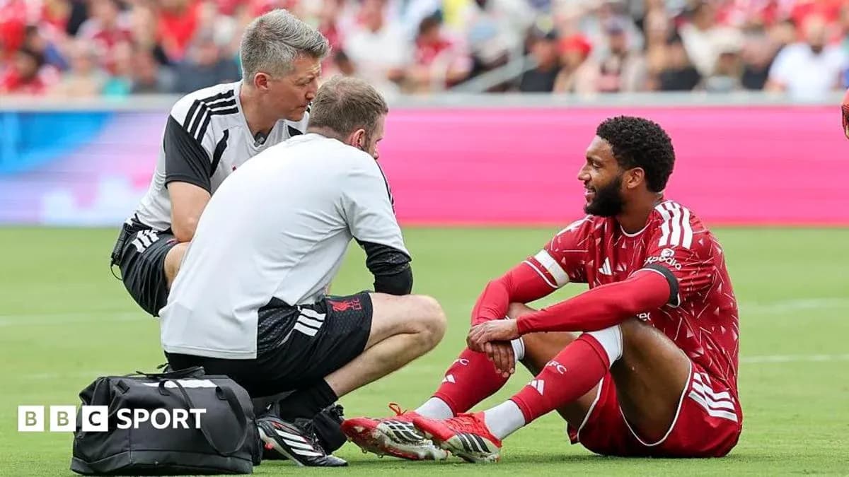 Player receiving medical attention on the field