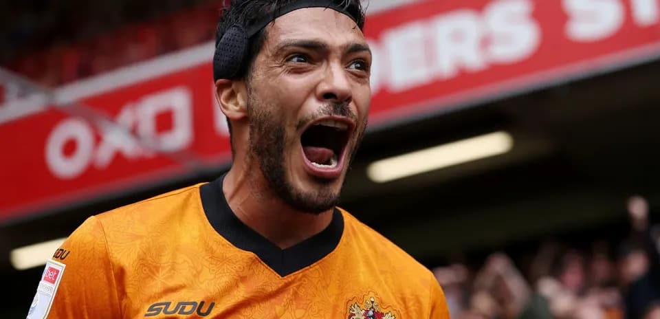 Player celebrating passionately after scoring a goal