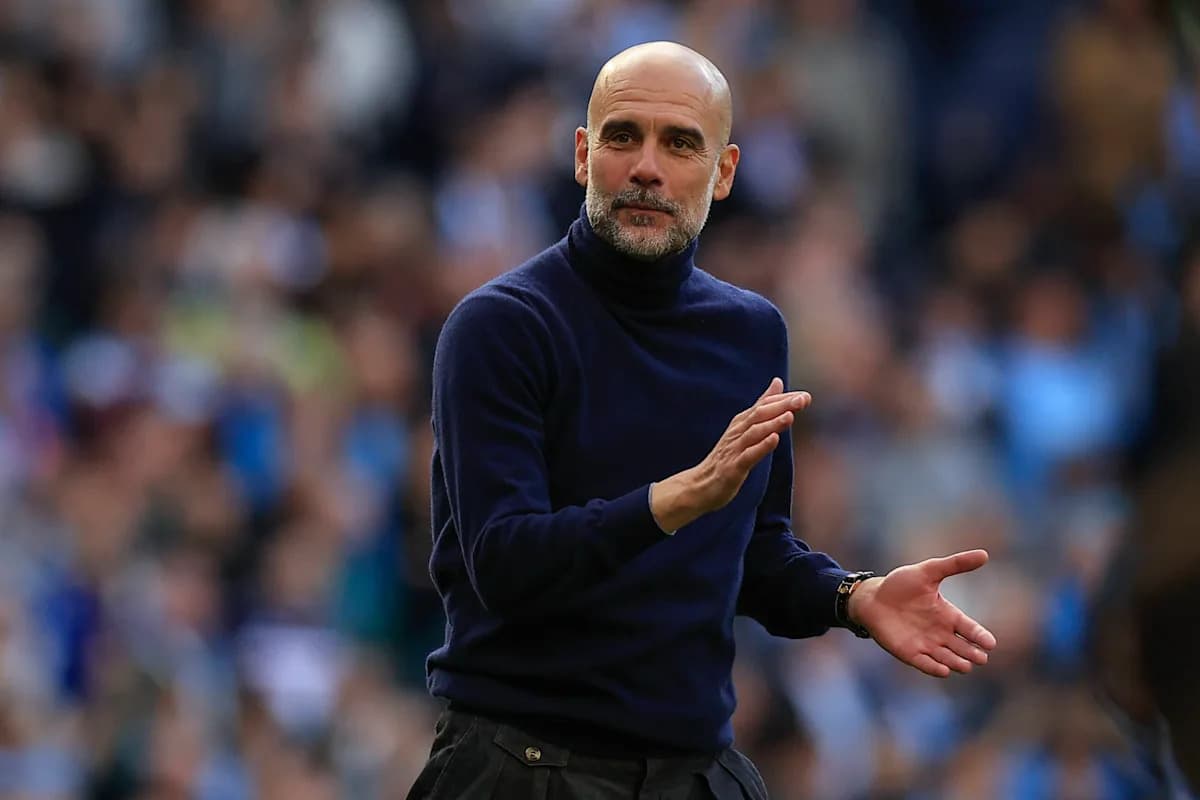 Coach gesturing during a football match on sidelines
