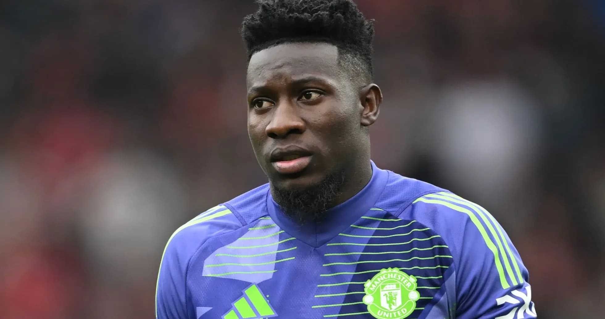 Goalkeeper in Manchester United kit during match