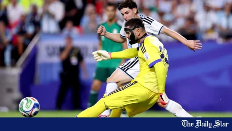 Goalkeeper in yellow jersey clearing ball during match