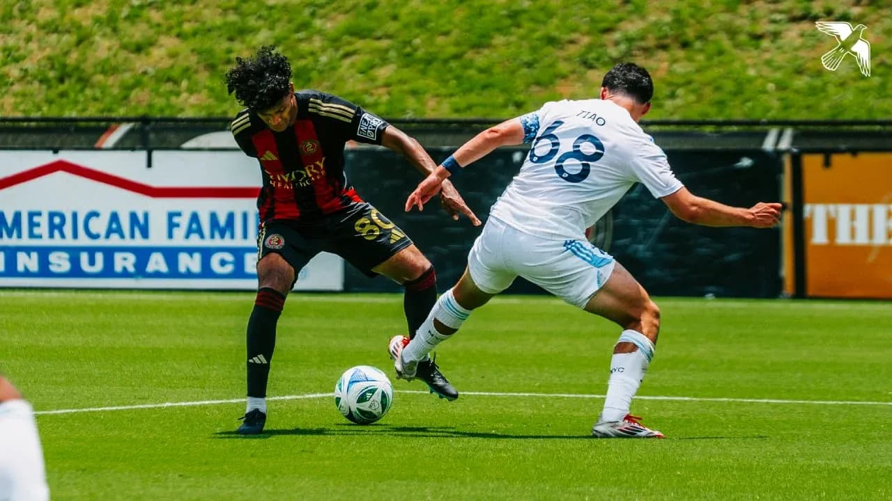 Atlanta United II player challenging New York City II opponent