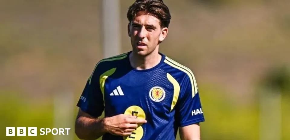 Player training in Scotland national team kit