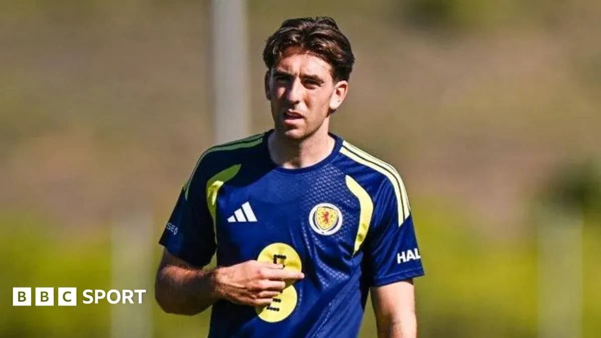 Player training in Scotland national team kit