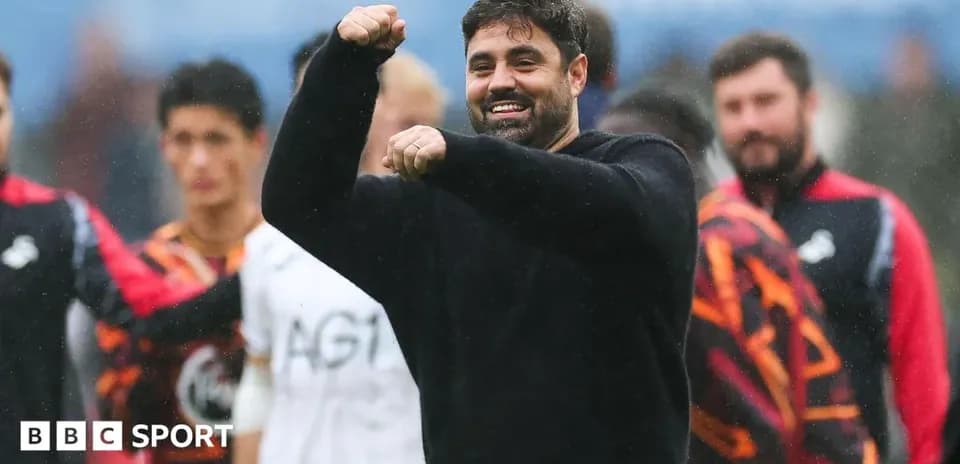 Coach celebrating with team during match victory