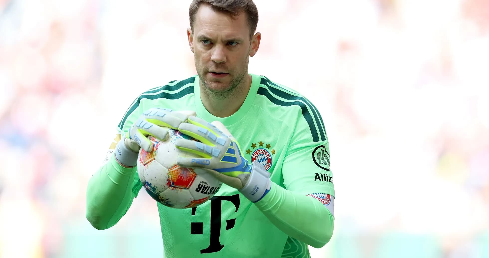 Goalkeeper holding the ball during match preparation