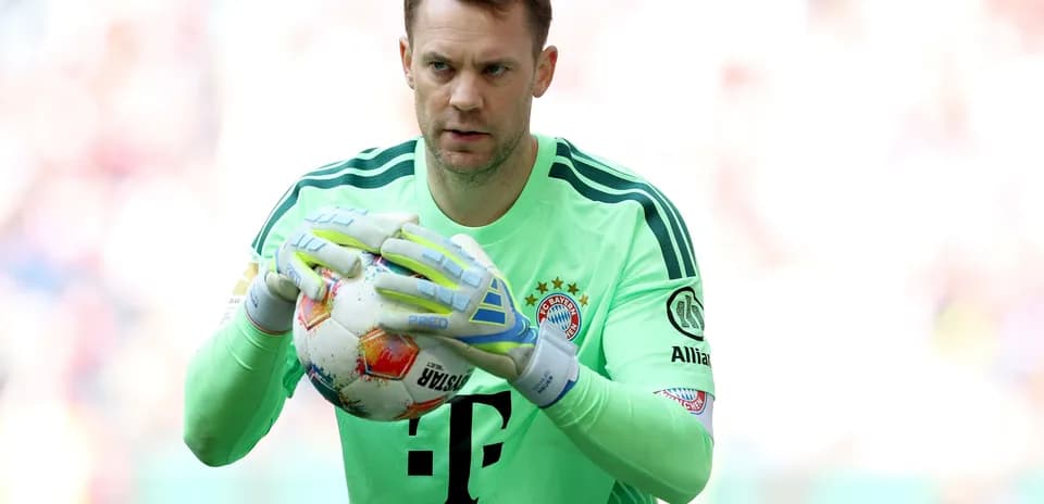 Goalkeeper holding the ball during match preparation