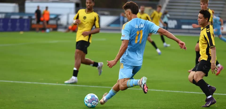 Player kicking ball during Sporting JAX match