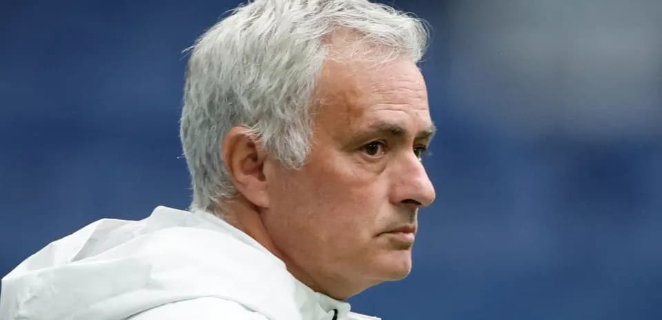 Coach looking on from the sidelines during match
