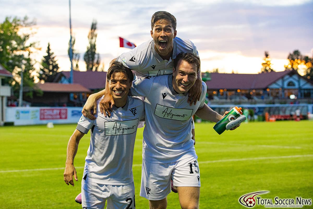 Vancouver FC players celebrating on the field