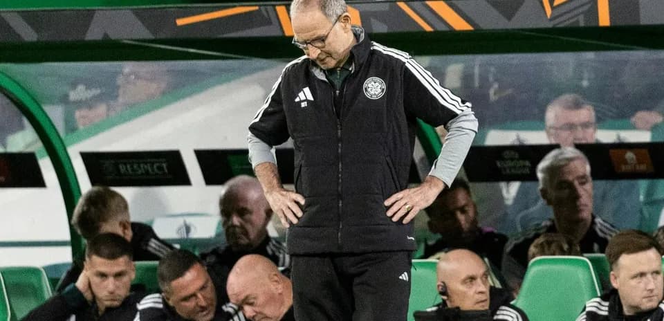 Manager looking down on the bench during match