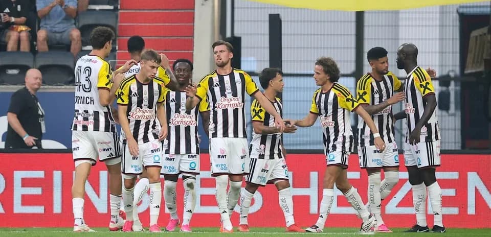 Team celebrating a goal during a match
