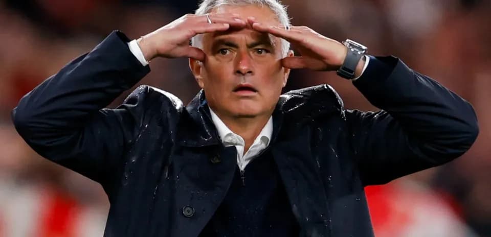Coach gesturing during a match from sidelines
