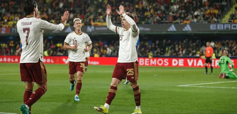 Spain players celebrating a goal during match