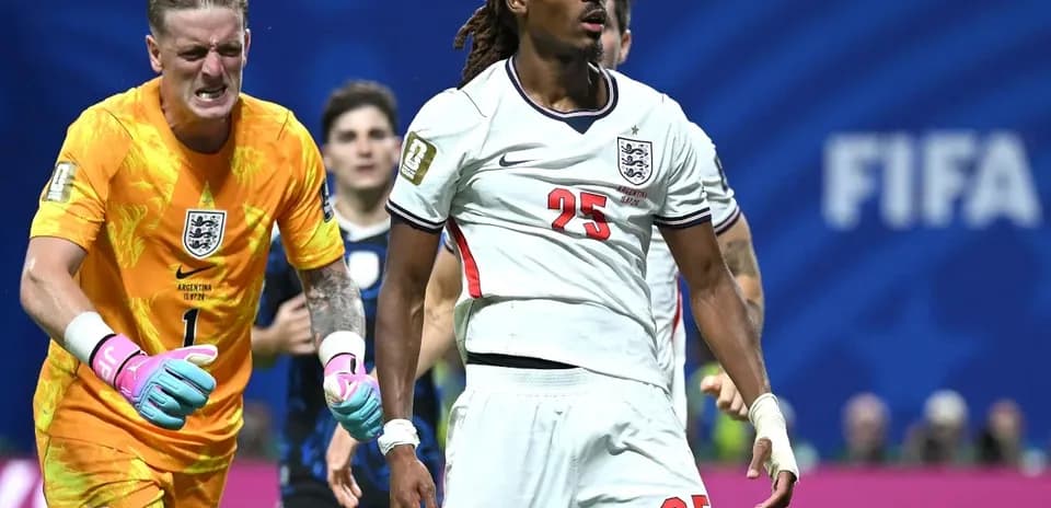 Players reacting during FIFA match with goalkeeper