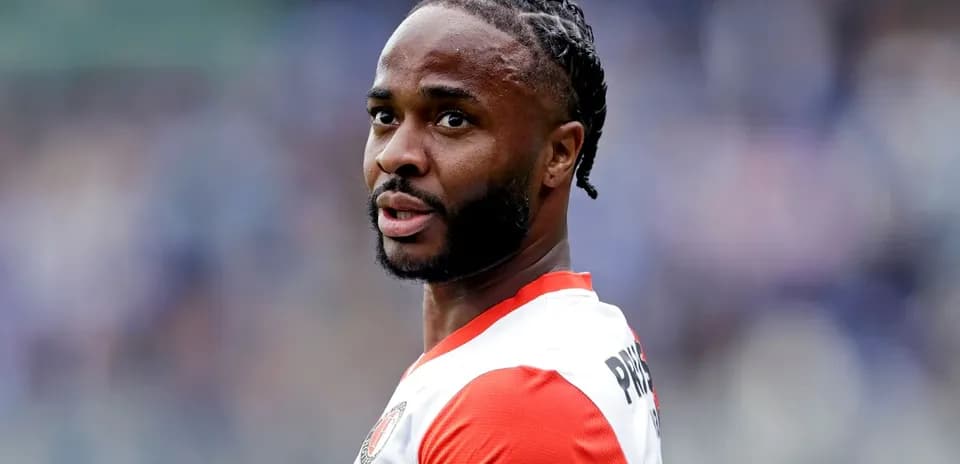 Player in team jersey looking towards the field