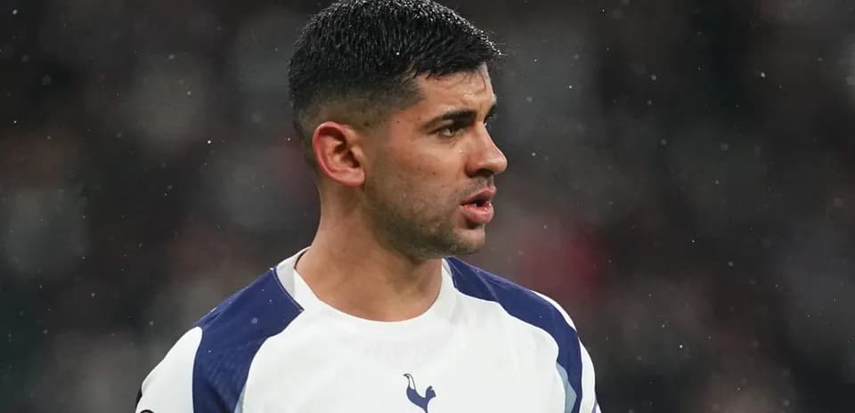 Player in Tottenham jersey during match action