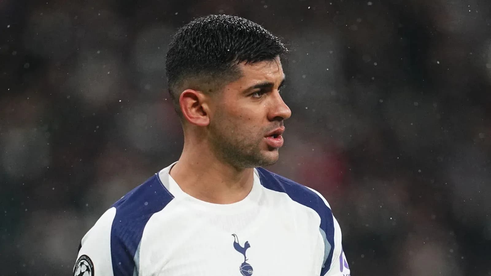 Player in Tottenham jersey during match action