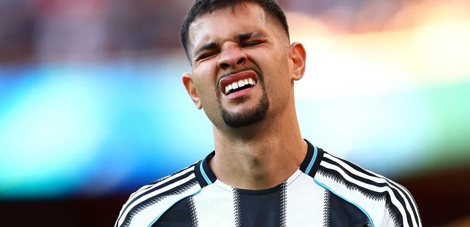 Player grimacing on the field during match
