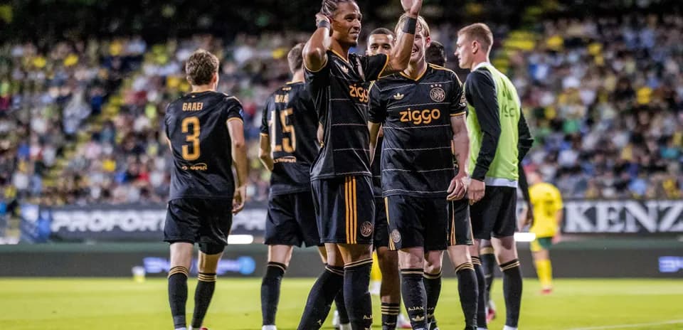 Ajax players celebrating during a match