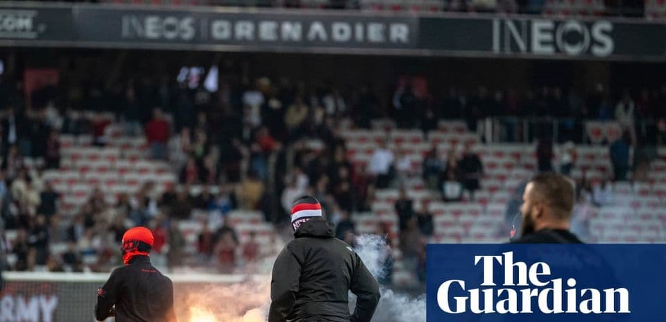 Fans setting off flares during a match