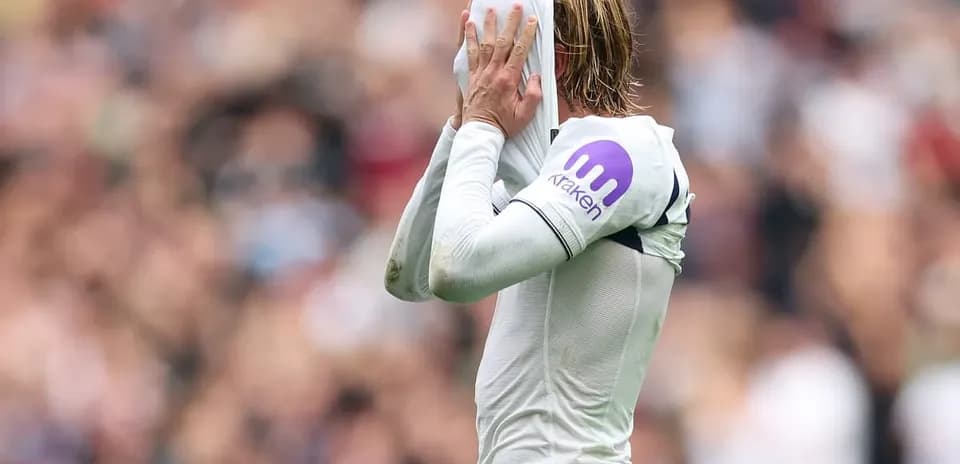 Player removing jersey during match action