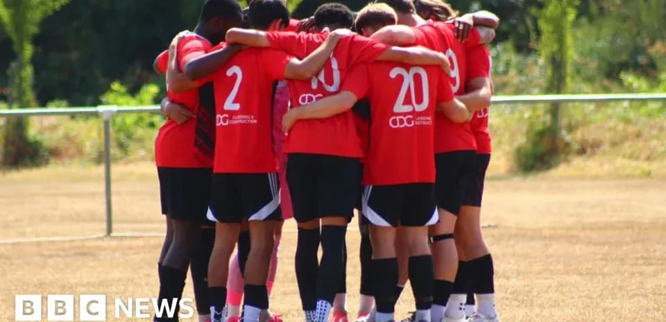 Team huddled together on training field