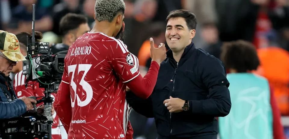 Player greeting coach during match warm-up