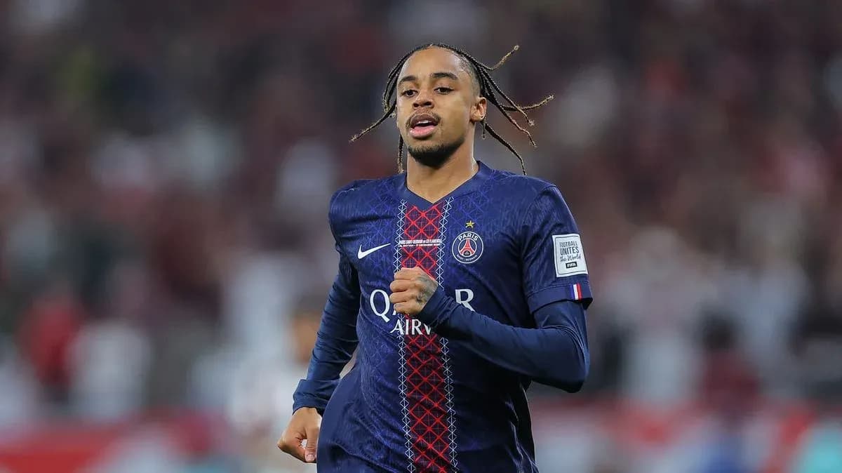 Player running in PSG kit during match