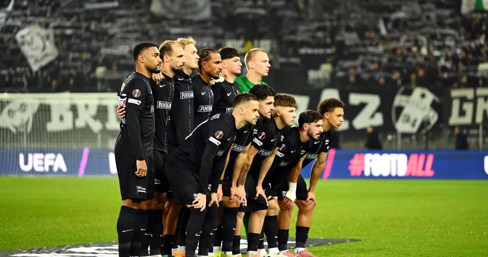 Sturm Graz team posing before UEFA match