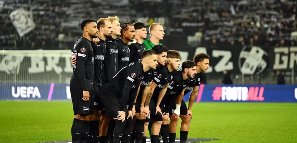 Sturm Graz team posing before UEFA match