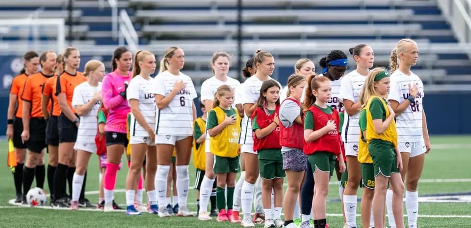 UConn women's soccer team lined up before the match