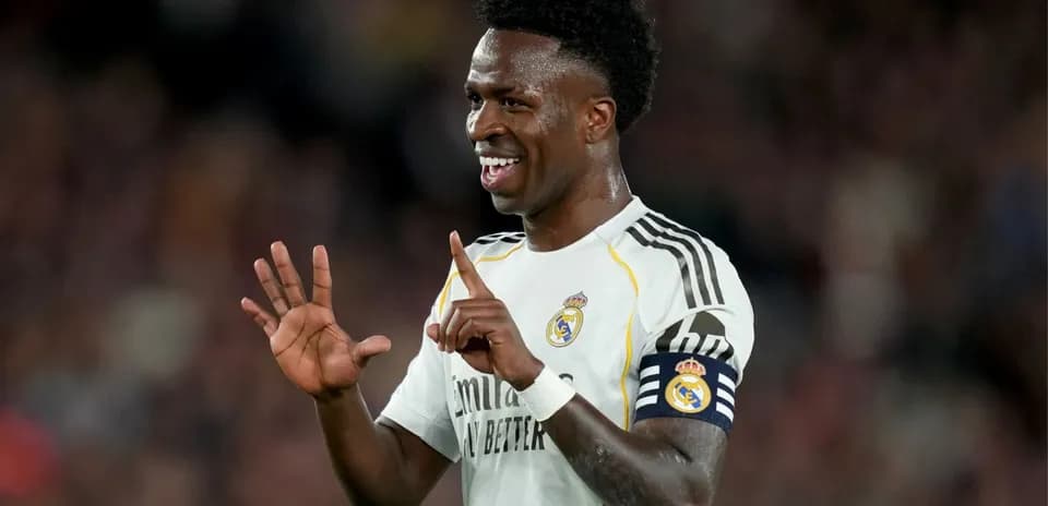 Player celebrating with fingers raised during match