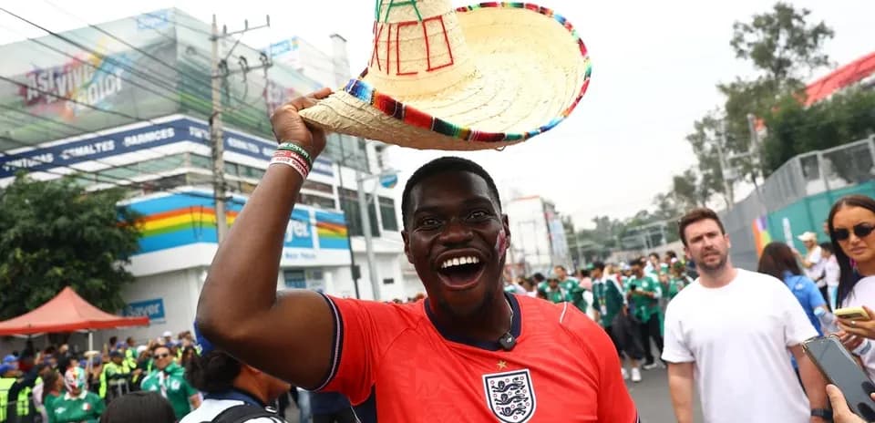 Fan in England jersey wearing sombrero at event