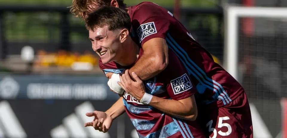 Colorado Rapids II players celebrating a goal