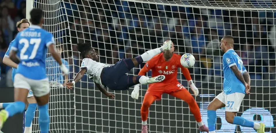 Player executing bicycle kick in Serie A match