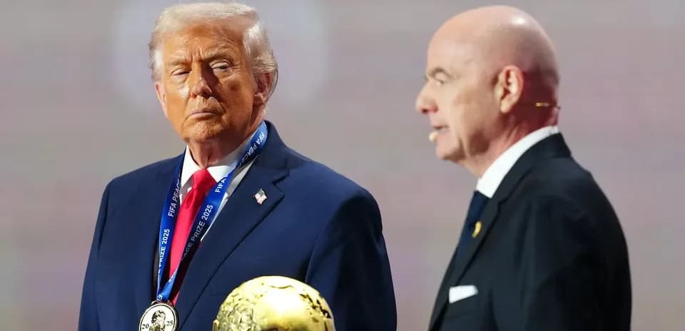 Donald Trump receiving FIFA award from official