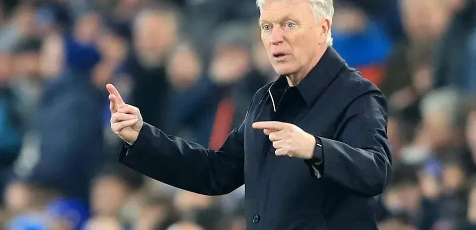 Manager giving instructions during a match