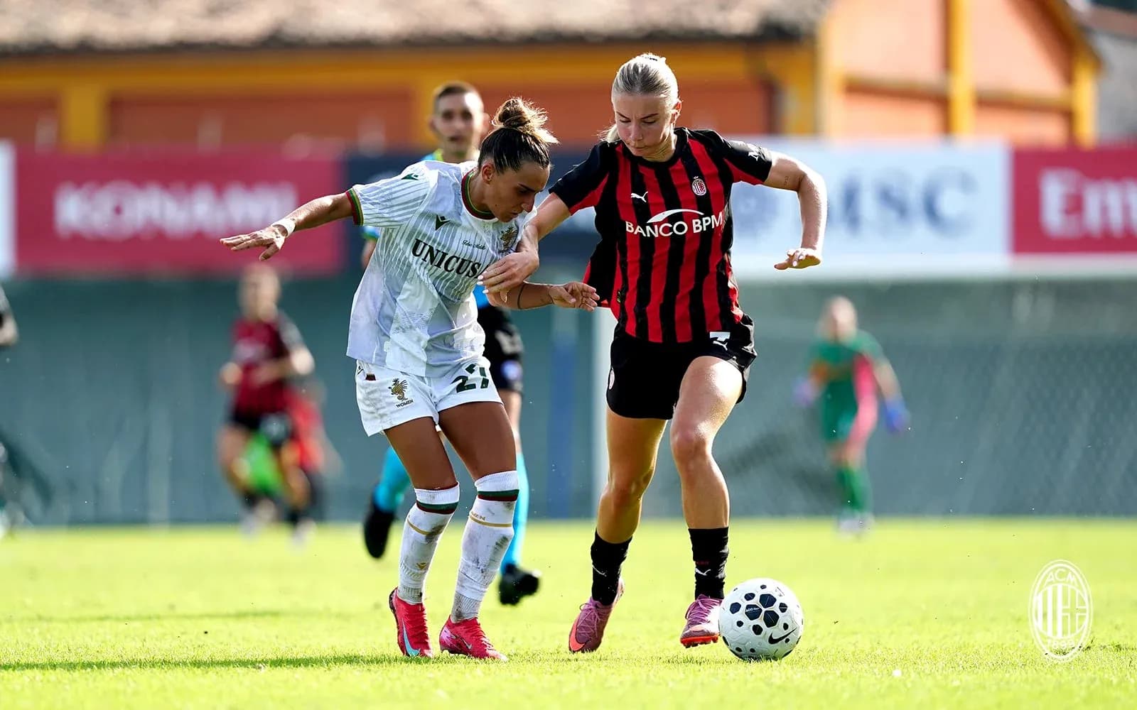Player challenging for the ball during match