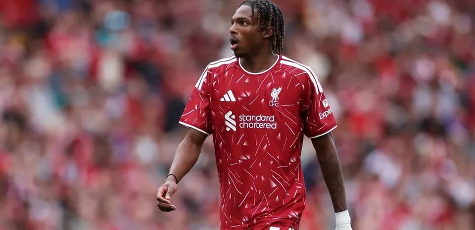 Player in Liverpool kit during match at stadium