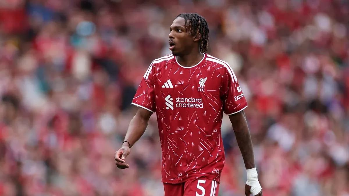 Player in Liverpool kit during match at stadium