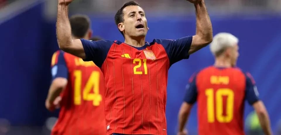 Player celebrating after scoring for Spain team