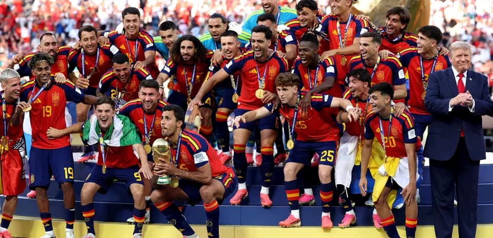 Spain team celebrating with trophy after winning tournament