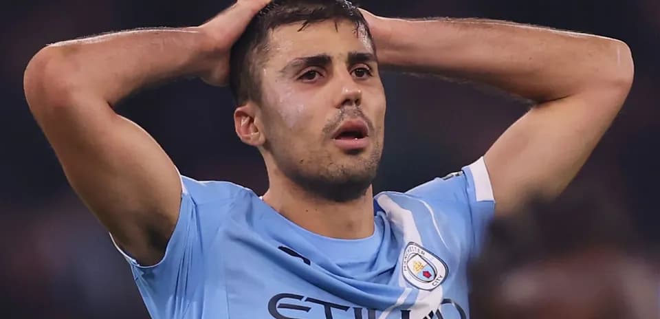Player holding head in distress during match