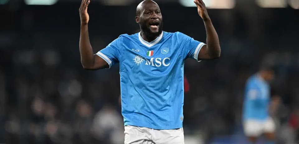 Player celebrating in Napoli home jersey during match