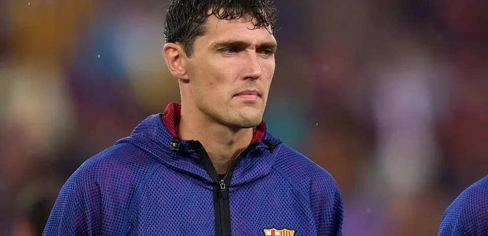 Player in FC Barcelona warm-up jacket on field